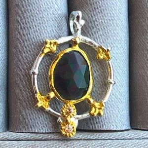 Sterling silver &  14kt gold (the gold is plated over SS) genuine black opal
